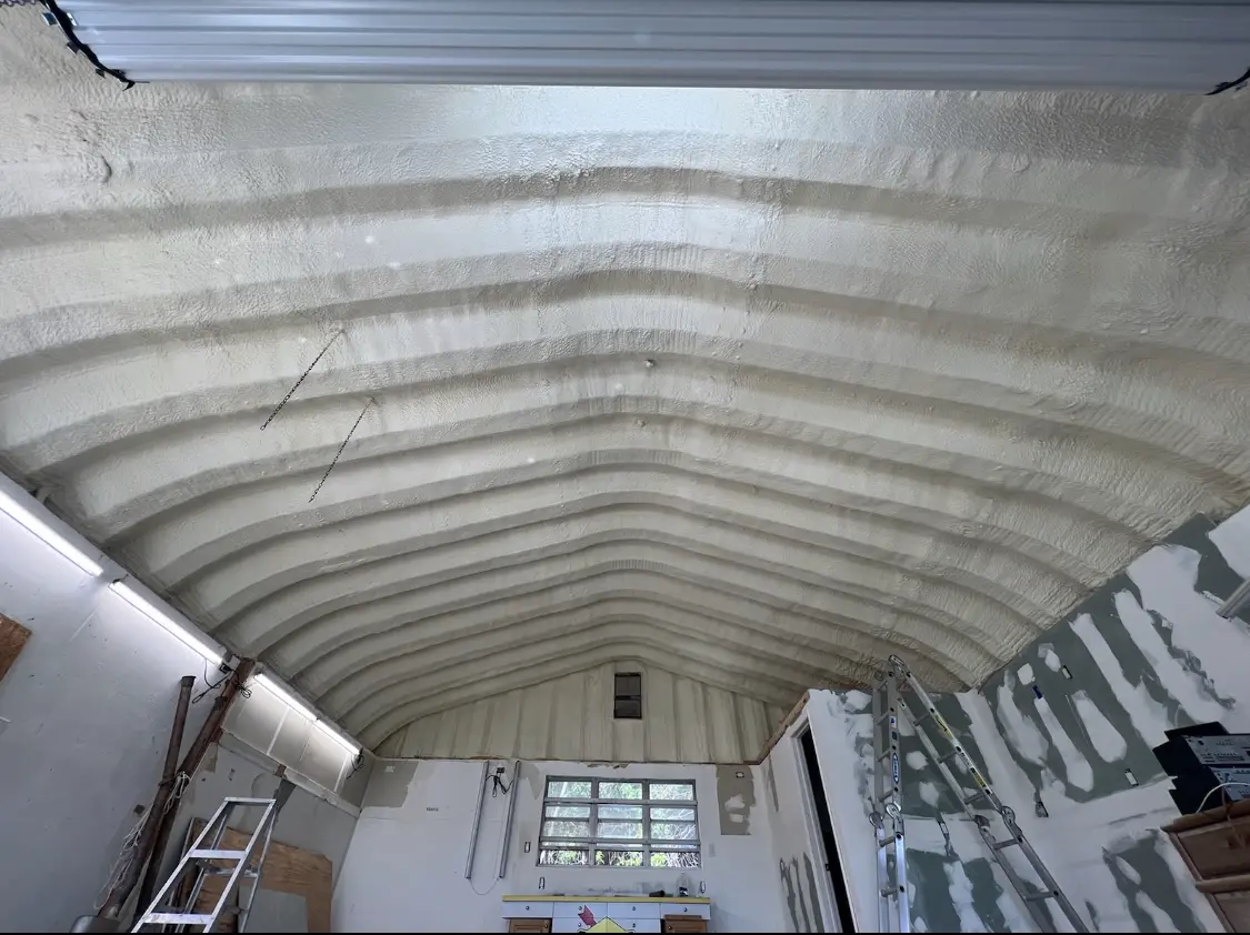 Spray polyurethane foam applied to the underside of a metal roof deck in West Odessa